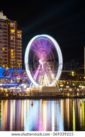 Long exposure picture of a ferris wheel rotating
