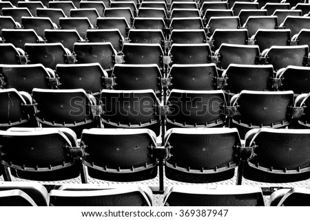 Amphitheater of seats, Black and white photo.