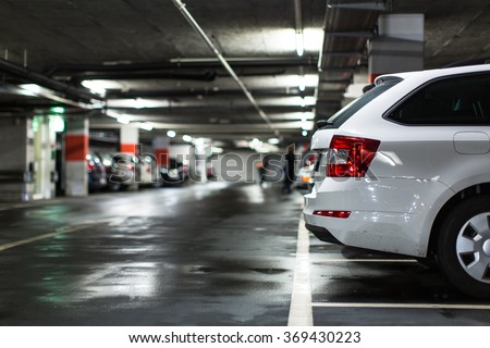 Underground parking/garage (shallow DOF; color toned image) Royalty-Free Stock Photo #369430223