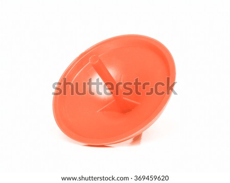  Red spinning top isolated over white background vintage