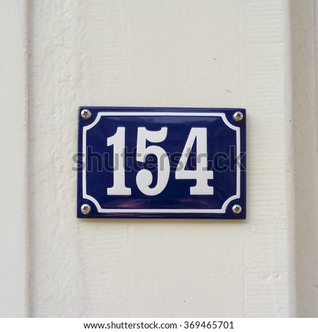 Enameled house number one hundred and fifty four