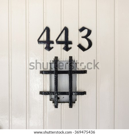 House number four hundred and forty three above a hash tag.