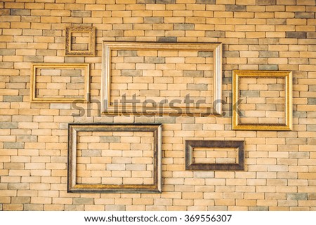 Blank photo frame decoration on brick wall textures for background - Vintage filter