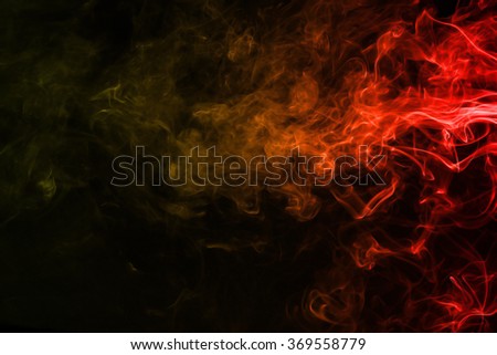 Red yellow smoke texture on dark background