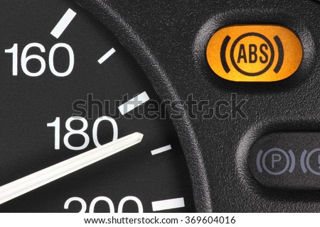 ABS warning light in car dashboard Royalty-Free Stock Photo #369604016