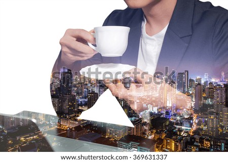 double exposure of business woman drink a coffee, tea and colorful of city in the night