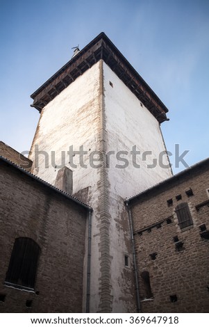 Tower and walls of the Herman castle or Hermanni linnus in Narva. Estonia. Vertical photo