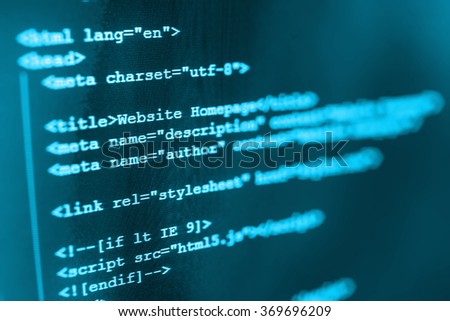 Computer source code programmer script developer. Modern technology background. Web software. Shallow depth of field, selective focus effect. All code and text written and created entirely by myself.