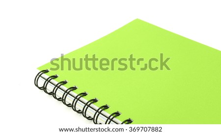 Green blank note book isolated on white background