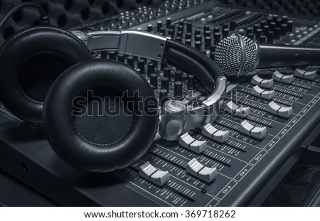 microphone,headphone,sound mixer background. Royalty-Free Stock Photo #369718262