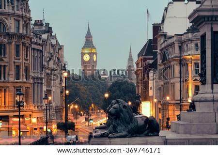 Street view of Trafalgar Square at night in London Royalty-Free Stock Photo #369746171