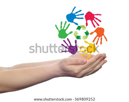 Concept or conceptual circle or spiral of colorful hand prints made by children with a green recycle symbol isolated on white background, for ecology, education, environment, eco, global nature