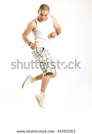 picture of a casual young man jumping