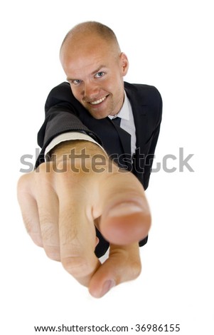 wide angle picture of a businessman pointing at camera
