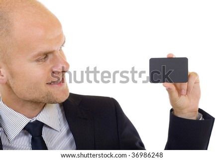 closeup picture of a business man handing a blank business card