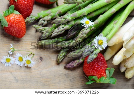 Asparagus, strawberries and daisies