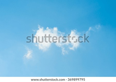white fluffy and clouds in the blue sky