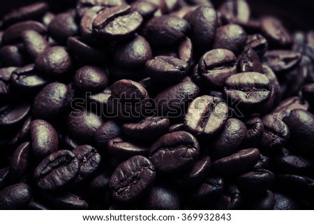 Different kinds of coffee on wooden plate. Selective focus. Toned.