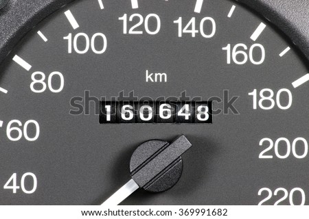 odometer of used car showing mileage of 160648 km Royalty-Free Stock Photo #369991682