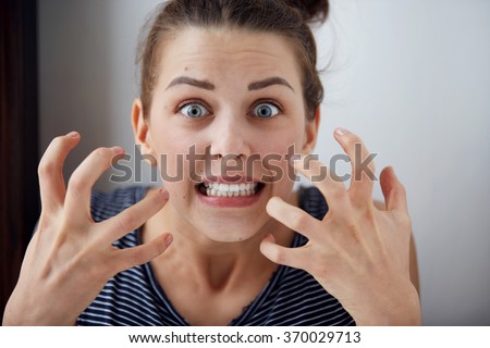 Portrait young angry woman unhappy, annoyed by something Human face expression emotion reaction Royalty-Free Stock Photo #370029713