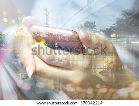 Businesswoman working with smartphone. Concept of modern technology, network connection. Image closed up hand make multiple layers and blur lens flare with blank space.