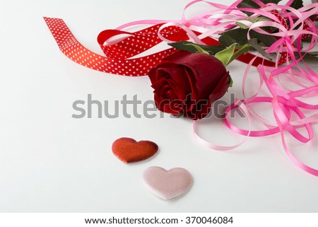 Valentines Day background, wedding day background, rose, red and pink ribbon, silk hearts on white background