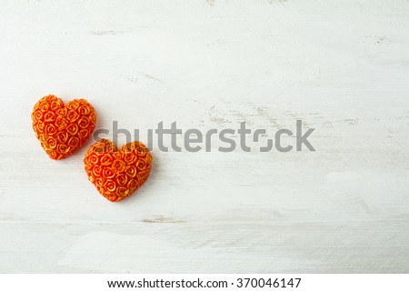 Hearts of roses on a white wooden background, Valentines Day background, wedding day background