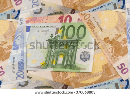 different Euro and dollar banknotes. kaleidoscope effect