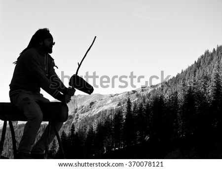 Man silhouette riding on a mountain 