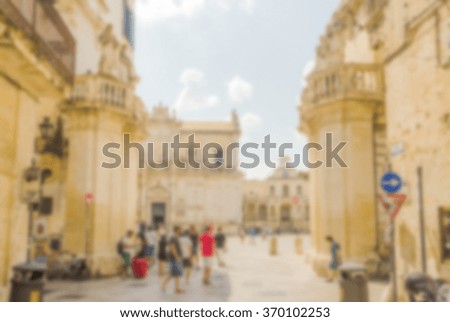 Defocused background of Propylaea, gateway of Cathedral Square in Lecce, Salento, Italy. Intentionally blurred post production for bokeh effect