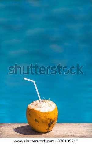 enjoy coconut water near pool.