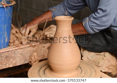 Close-up on potter making a ceramics jar near the town of Ban Tha Hai in Ubonratchathani, Thailand