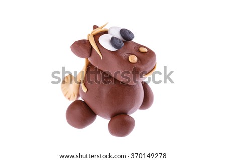 Horse from plasticine on white background
