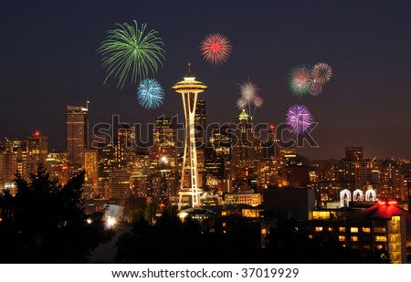 4th of July celebrations and fireworks over Seattle downtown skyline