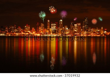 Fireworks over Seattle skyline from Alki park on 4th of July celebration