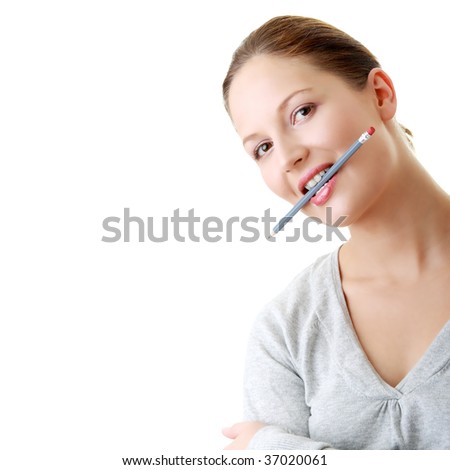 The young beautiful student with pencil on a white background