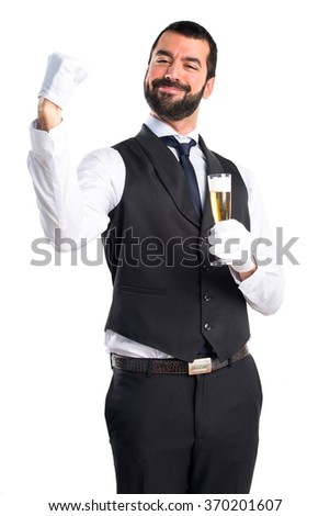 Lucky luxury waiter with champagne