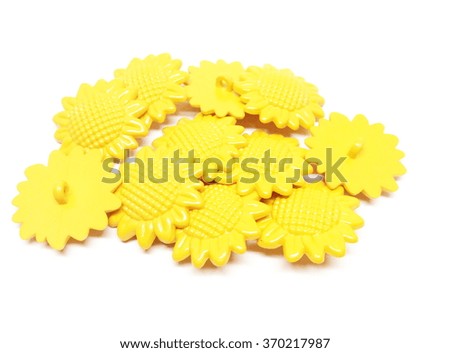 Yellow buttons isolated on white