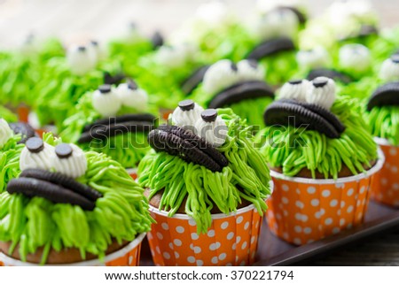 Chocolate cupcakes with green frosting