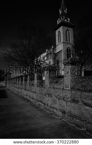 Old church and courtyard in black and white