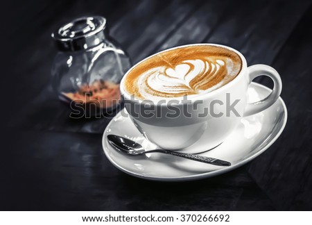 hot latte cup in the dark (retro style)