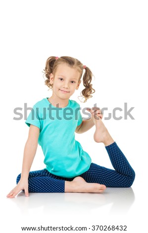 Little girl doing fitness exercises