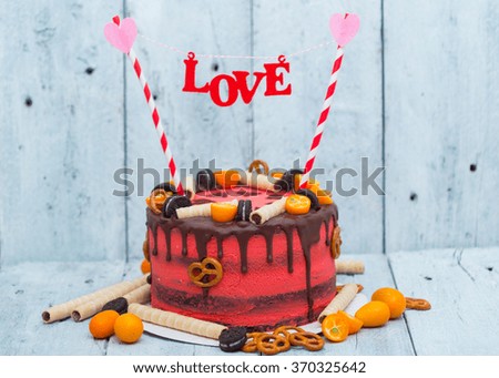 Homemade cake for Valentine's day decorated with word love