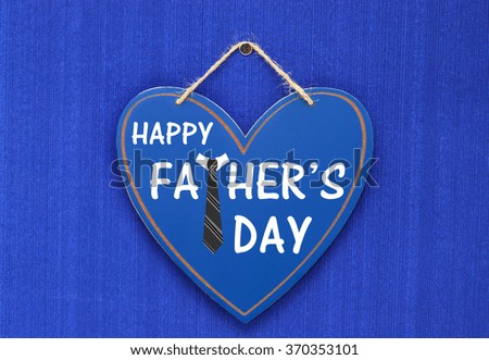 Happy Father's Day Heart Chalkboard Sign Hanging on Blue Wall