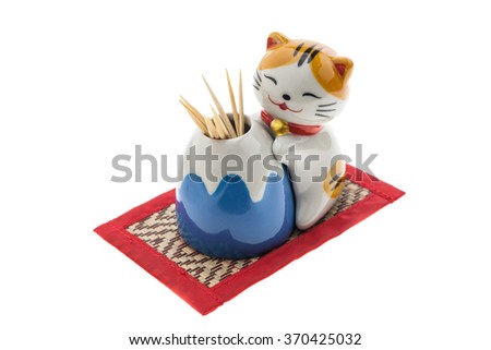 Ceramic cats is a Toothpick holder.