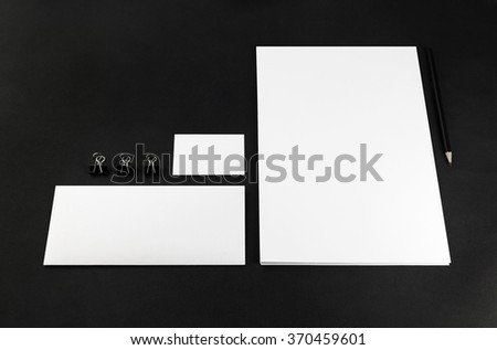 Photo of blank stationery and corporate identity template on dark background.  For design presentations and portfolios. Mock-up for branding identity.