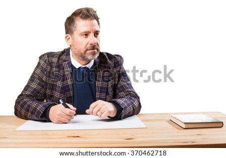 mature man working on his desktop
