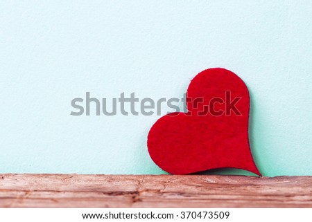 Heart on a wooden table.valentines day
