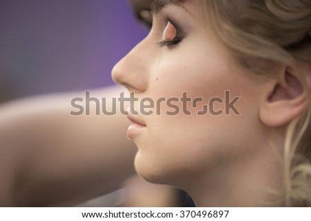 Application of wedding makeup. Preparation of the bride. Boho style. Ease of braided hair braids.