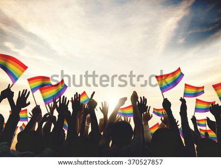 Gay Rainbow Flag Crowd Celebration Arms Raised Concept Royalty-Free Stock Photo #370527857
